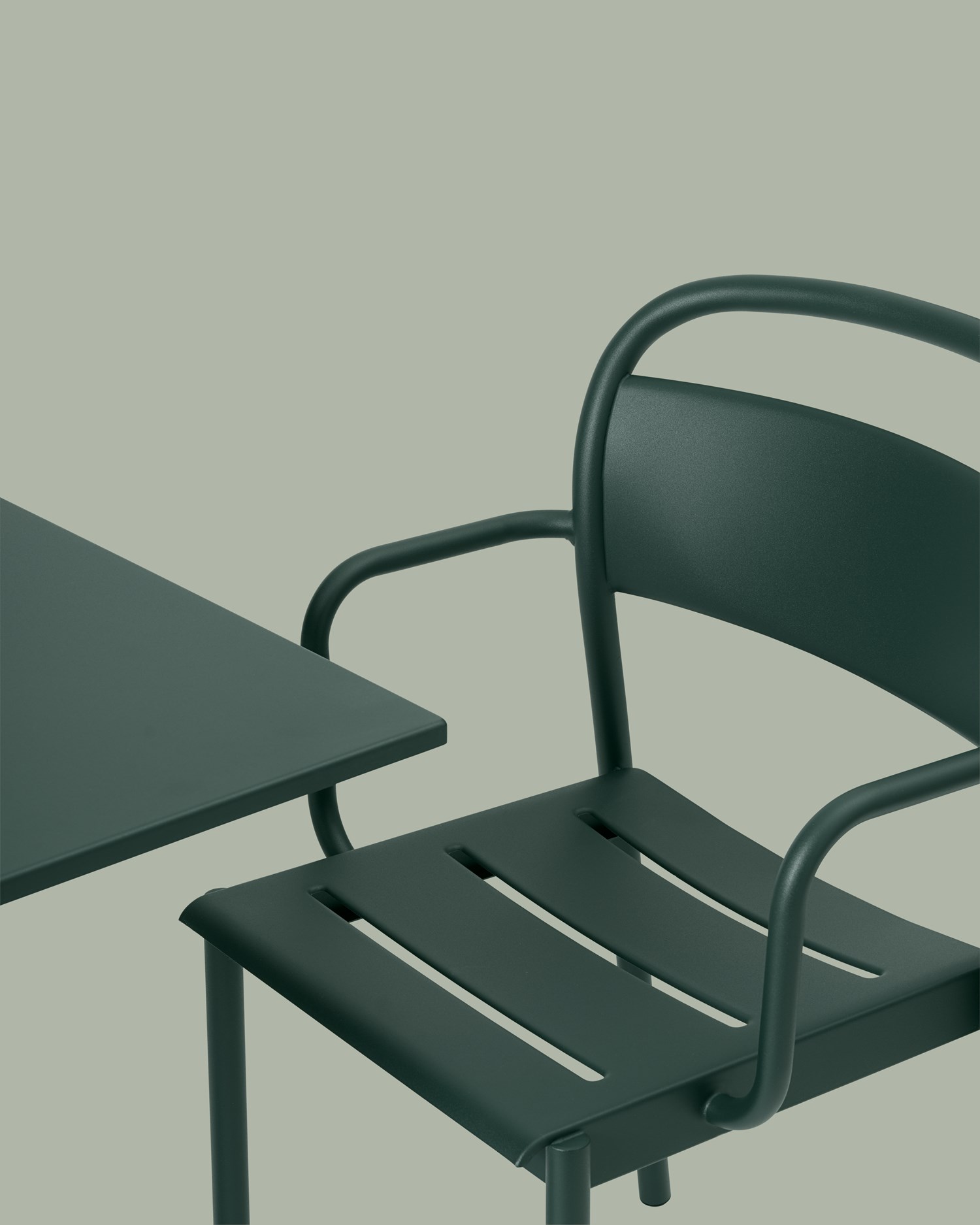 Linear-steel-armchair-cafe-table-70x70-h73-dark-green-detail-Muuto-5000x5000-hi-res-CB2